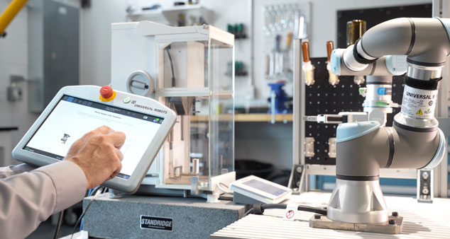 Scientist inspecting a laboratory tablet/monitor
