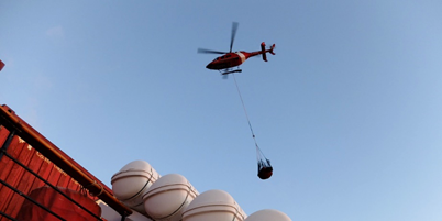 Luggage being moved ashore in the sunrise